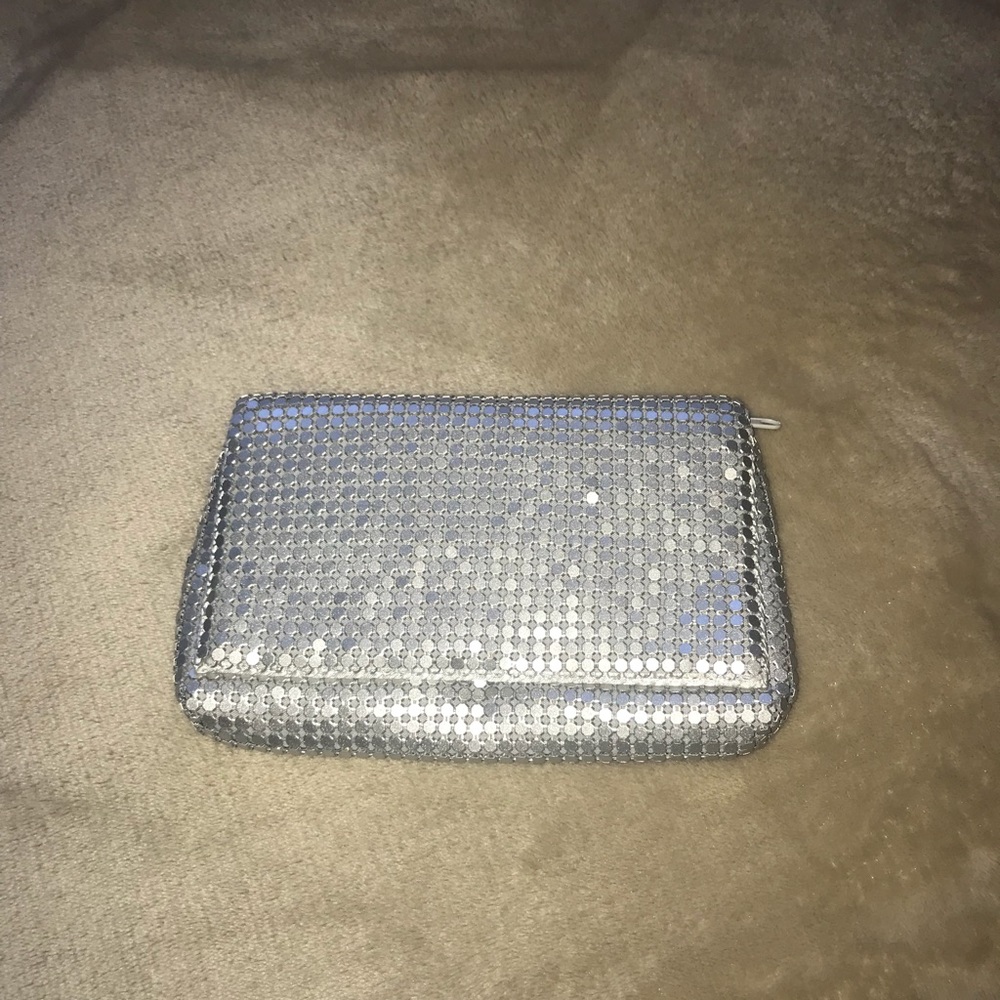 Small shiny silver NY & Co. clutch bag